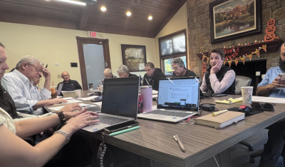 Beach Club Project Team Meeting at Work