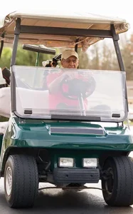 Golf cart being driven in the Stonebridge Ranch Community