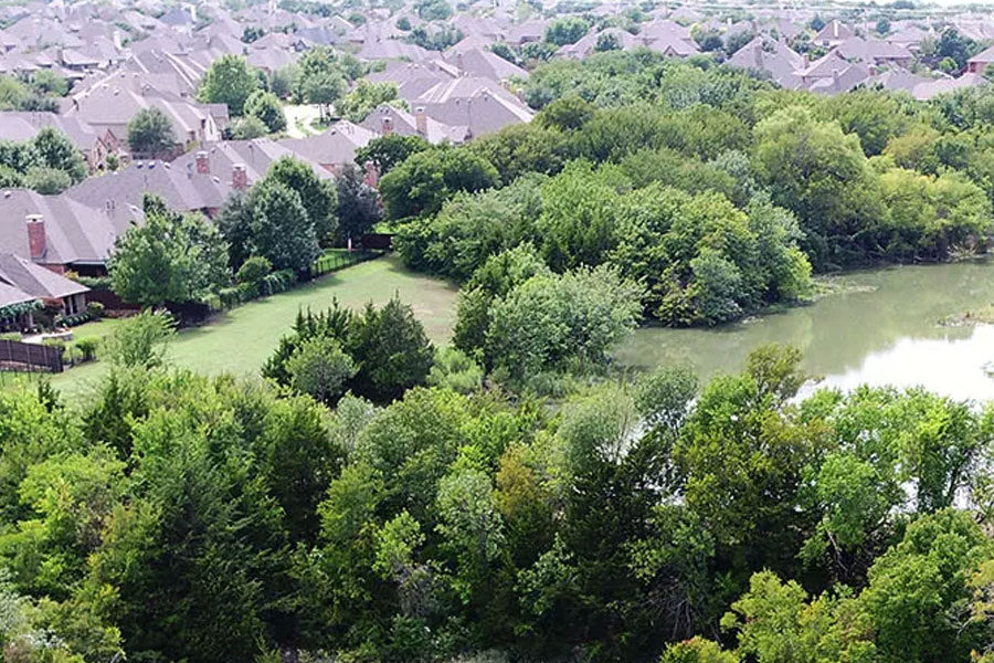 La Cima pond and surrounding homes in the SRCA Community