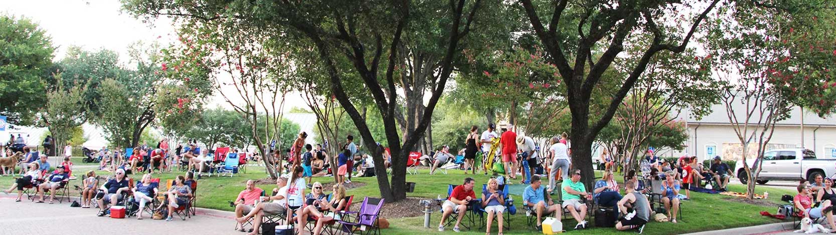 Stonebridge Ranch Community residents socializing at an outdoor community concert
